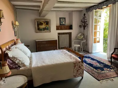 Un ou plusieurs lits dans un hébergement de l'établissement Nouveau! Propriété historique avec piscine, proche châteaux de la Loire et Futuroscope