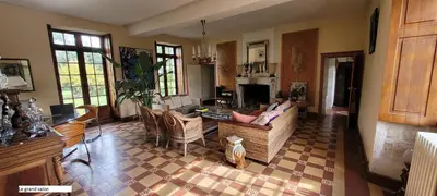 Coin salon dans l'établissement Nouveau! Propriété historique avec piscine, proche châteaux de la Loire et Futuroscope