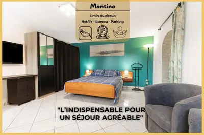 Un ou plusieurs lits dans un hébergement de l'établissement Montino - Studio 5 min du circuit - Parking - Wifi
