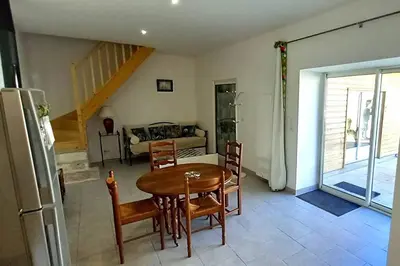 Coin salon dans l'établissement Maison chaleureuse