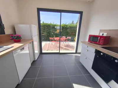 Cuisine ou kitchenette dans l'établissement Les bambous - 2 logements 10min du zoo neuf-confort-famille-jeux pour enfants