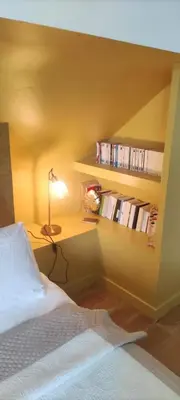 Un ou plusieurs lits dans un hébergement de l'établissement Chambre chez l'habitant et Chambre insolite caravane Luxe-Cheverny -Chambord -Zoo Beauval-Chenonceau