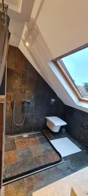 Salle de bains dans l'établissement Le Nid d'Anatole