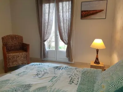 Un ou plusieurs lits dans un hébergement de l'établissement Maison au calme avec piscine l'été