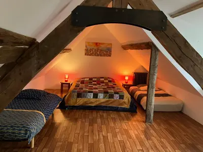 Un ou plusieurs lits dans un hébergement de l'établissement Magnifique maison de maître saumuroise