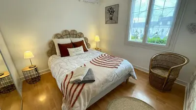 Un ou plusieurs lits dans un hébergement de l'établissement Au Gré des Souvenirs, gite 4 à 10 pers, clim, jacuzzi, loisirs