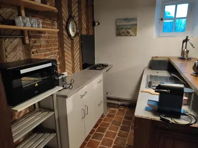 Cuisine ou kitchenette dans l'établissement La Coquerie