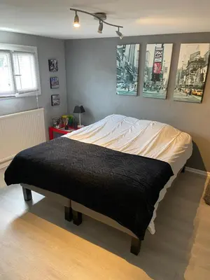 Un ou plusieurs lits dans un hébergement de l'établissement Maison d Angele 4 chambres