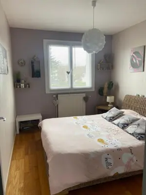 Un ou plusieurs lits dans un hébergement de l'établissement Maison d Angele 4 chambres