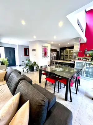 Coin salon dans l'établissement Maison à 5 minutes des 24H du Mans