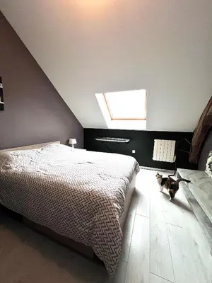 Un ou plusieurs lits dans un hébergement de l'établissement Maison à 5 minutes des 24H du Mans