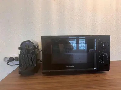 Télévision ou salle de divertissement dans l'établissement Un séjour à Tours centre place des Halles
