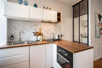Cuisine ou kitchenette dans l'établissement Le Jardin De Guilbaud - Hypercentre - Netflix