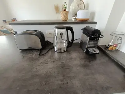Cuisine ou kitchenette dans l'établissement T3 centre-ville avec parking