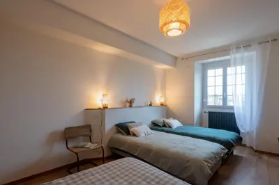 Un ou plusieurs lits dans un hébergement de l'établissement Gîte 4-6 pers - Gennes-Val-de-Loire
