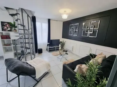 Coin salon dans l'établissement Maison aux portes de Tours