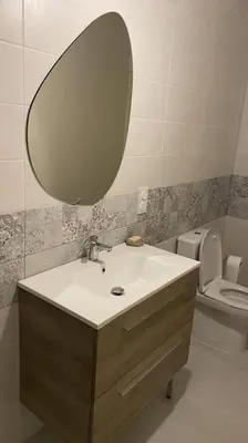 Salle de bains dans l'établissement Le cocon du Faubourg