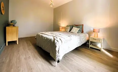 Un ou plusieurs lits dans un hébergement de l'établissement Maison Bollée 6 Pers moderne avec Jardin
