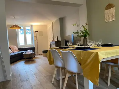 Coin salon dans l'établissement Maison Bollée 6 Pers moderne avec Jardin