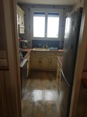 Cuisine ou kitchenette dans l'établissement chambre confort dans un logement partagé à 10 minute du circuit 24h