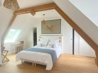 Un ou plusieurs lits dans un hébergement de l'établissement Les chambres d'hôtes du petit bois