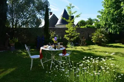 Jardin de l'établissement Les chambres d'hôtes du petit bois