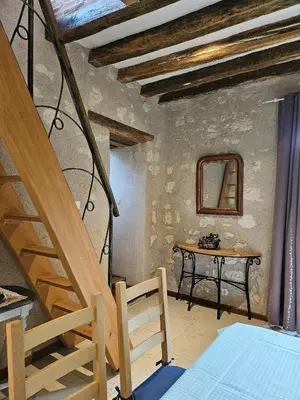 Un ou plusieurs lits dans un hébergement de l'établissement Moulin de Galerne, Le gite Du Four à Pain