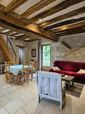 Coin salon dans l'établissement Moulin de Galerne, Le gite Du Four à Pain