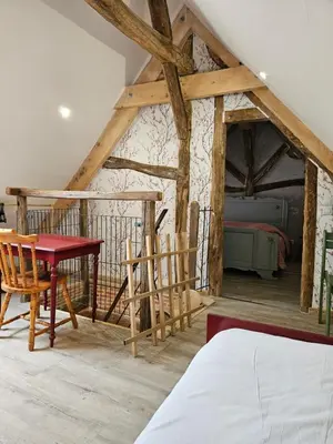 Un ou plusieurs lits dans un hébergement de l'établissement Moulin de Galerne, Le gite du Meunier