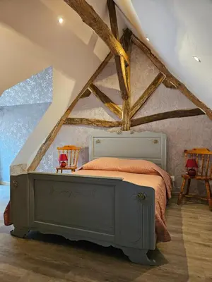 Un ou plusieurs lits dans un hébergement de l'établissement Moulin de Galerne, Le gite du Meunier