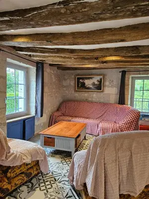 Un ou plusieurs lits dans un hébergement de l'établissement Moulin de Galerne, Le gite du Boulanger