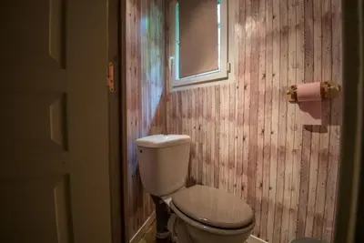 Salle de bains dans l'établissement Les maudines