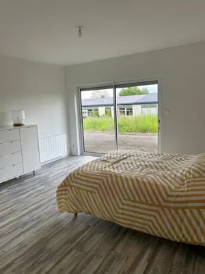 Un ou plusieurs lits dans un hébergement de l'établissement Maisons 50m2