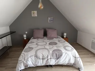 Un ou plusieurs lits dans un hébergement de l'établissement gite de la grand maison les chênes
