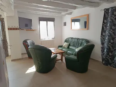 Coin salon dans l'établissement gite de la grand maison les chênes