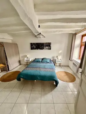 Un ou plusieurs lits dans un hébergement de l'établissement Appartement Situé au cœur de Brissac-Quincé