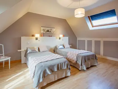 Un ou plusieurs lits dans un hébergement de l'établissement Gîte 4 chambres avec piscine couverte et jardin proche des châteaux de la Loire - FR-1-491-370