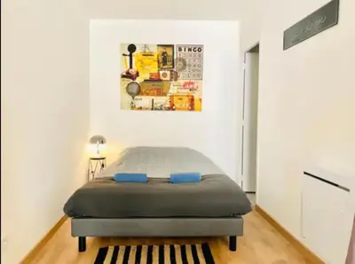 Un ou plusieurs lits dans un hébergement de l'établissement Bel Appartement Lumineux - 2 Voyageurs