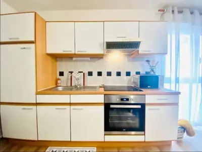 Cuisine ou kitchenette dans l'établissement Bel Appartement Lumineux - 2 Voyageurs