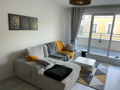 Coin salon dans l'établissement Appartement 24h du Mans