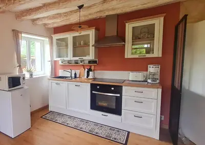 Cuisine ou kitchenette dans l'établissement Maison campagne détente