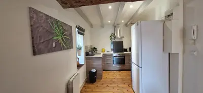 Cuisine ou kitchenette dans l'établissement La Campinoise