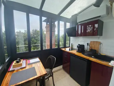 Cuisine ou kitchenette dans l'établissement Le Cocon Troglodyte