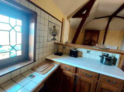 Cuisine ou kitchenette dans l'établissement Au Jardin Secret proche Center Parcs