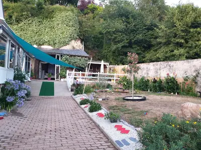 Jardin de l'établissement L 'appartement du Rocher