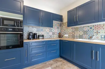 Cuisine ou kitchenette dans l'établissement L'oberlin charmante maisonnette