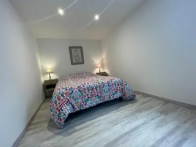 Un ou plusieurs lits dans un hébergement de l'établissement Maison du circuit - Hunaudières
