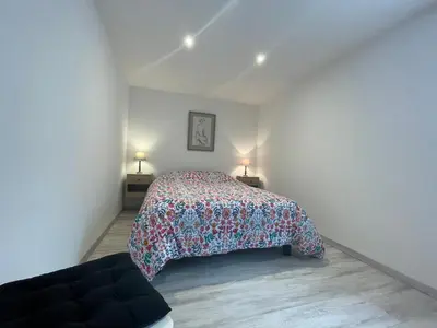 Un ou plusieurs lits dans un hébergement de l'établissement Maison du circuit - Hunaudières