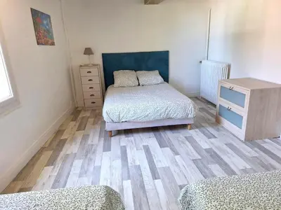 Un ou plusieurs lits dans un hébergement de l'établissement La Maison Douessine - Hyper Centre Doué La Fontaine - WIFI gratuit -Proche Bioparc Zoo