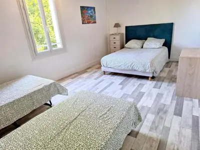Un ou plusieurs lits dans un hébergement de l'établissement La Maison Douessine - Hyper Centre Doué La Fontaine - WIFI gratuit -Proche Bioparc Zoo